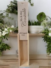 Load image into Gallery viewer, Close-up of custom engraving on a wooden wine box, featuring personalised text and logos.&quot;
